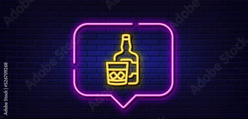 Neon light speech bubble. Whiskey glass with ice cubes line icon. Scotch alcohol sign. Neon light background. Whiskey glass glow line. Brick wall banner. Vector