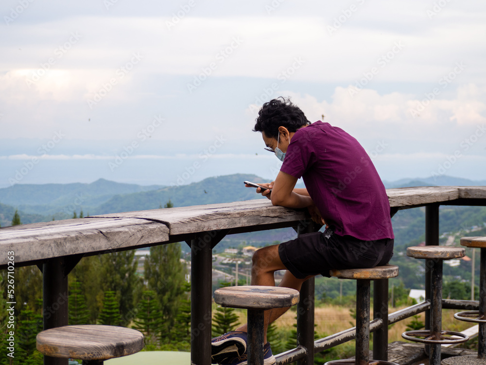 Asian man and mountain at Phetchabun, Thailand.