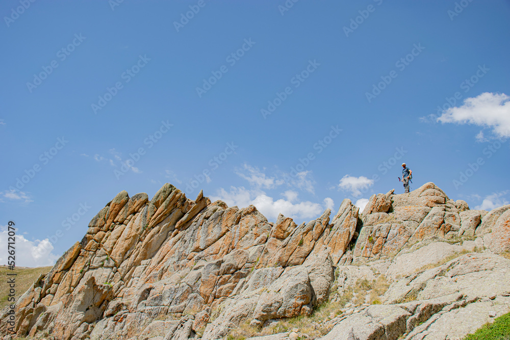 person on the top of the mountain person on the top of the mountain