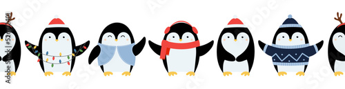 Seamless border of cute hand drawn penguins with accessories. Cartoon character for winter Christmas design