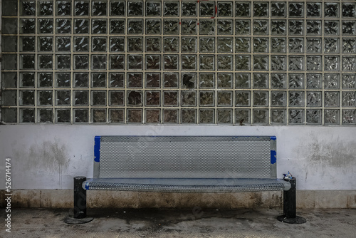 Empty bench in bush station