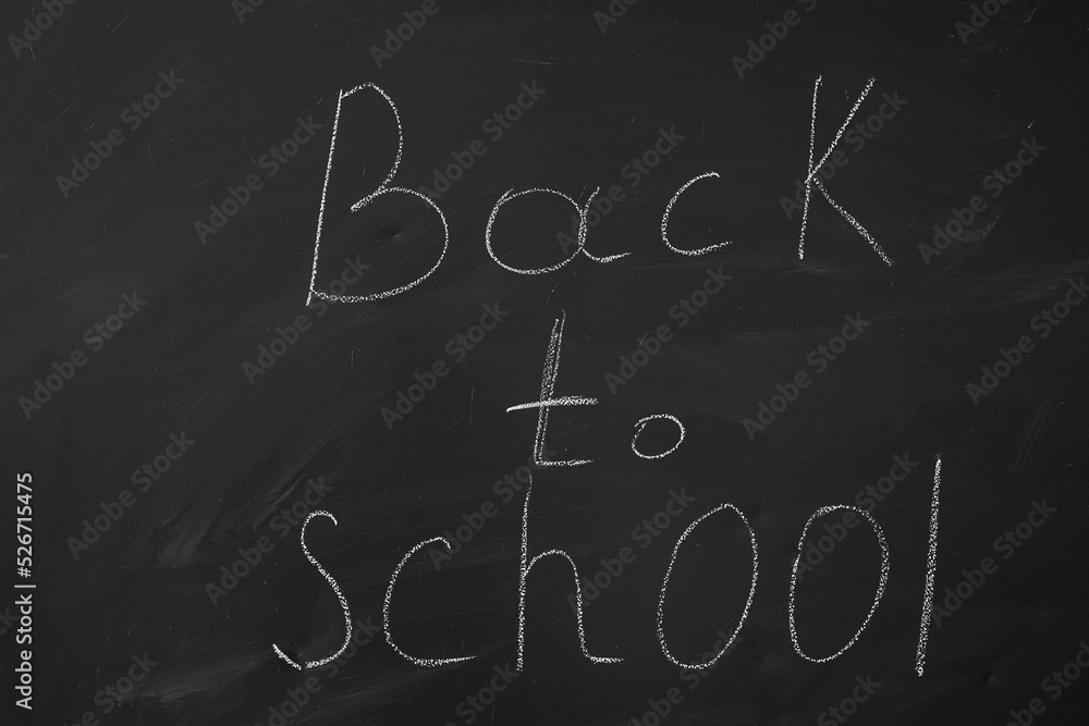 education concept, back to school written on blackboard education concept, back to school written on blackboard