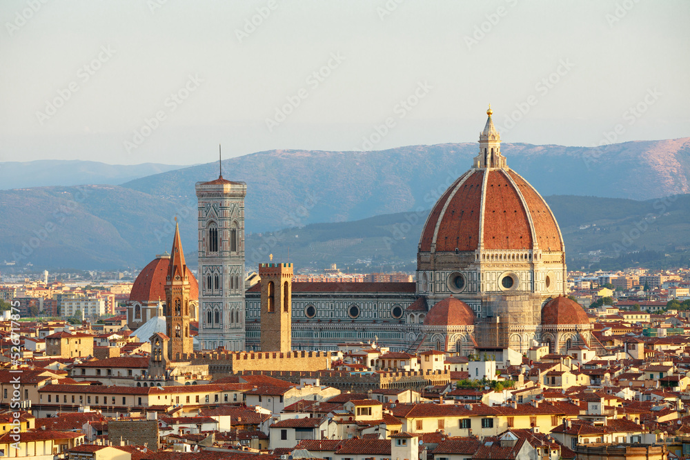 Cathedral of Santa Maria del Fiore and Giotto's Bell Tower at dawn. Florence, Italy. Panorama of the city