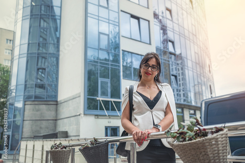 Portrait of happy business woman looking thoughtfully contemplating and thinking about career.