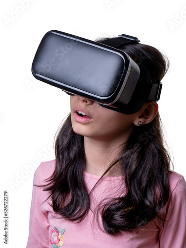 VR glasses , little girl with virtual reality headset. Innovation technology and education concept. Funny girl using a virtual reality headset isolated on white background © Нигяр Гусейнова