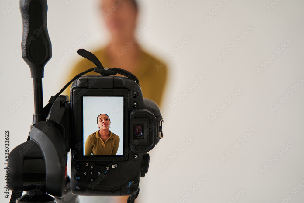 Camera screen view of the multiracial girl posing with cute face at the ...