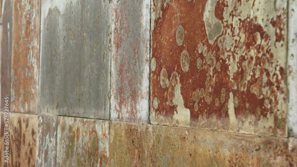 Texture wall exterior tile with rusty weathered brown grunge surface Texture wall exterior tile with rusty weathered brown grunge surface