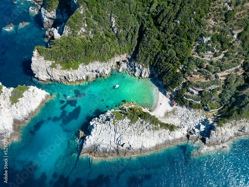 Aerial view of the secluded Spilia Beach at the rough and cliffy east coast of Skopelos island, Sporades, Greece photo