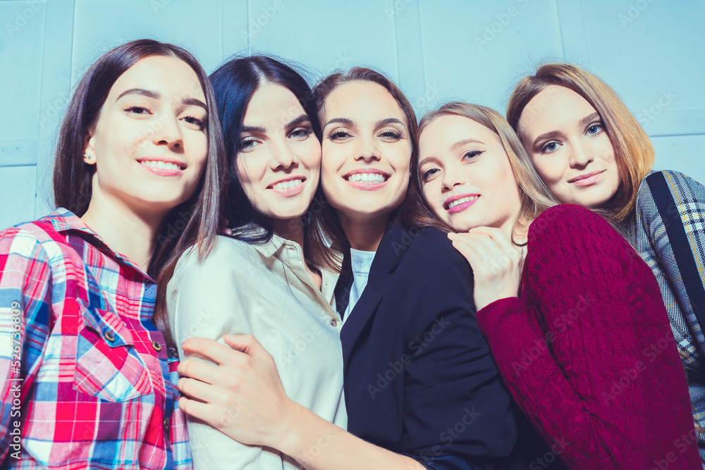 Fototapeta premium A portrait of happy beautiful girlfriends.