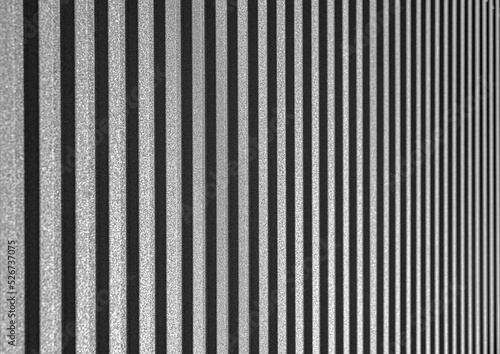 Metallic gray striped sheet as an abstract background.