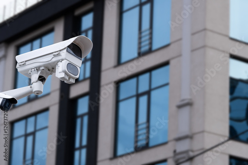 Security CCTV camera or surveillance system in office building.