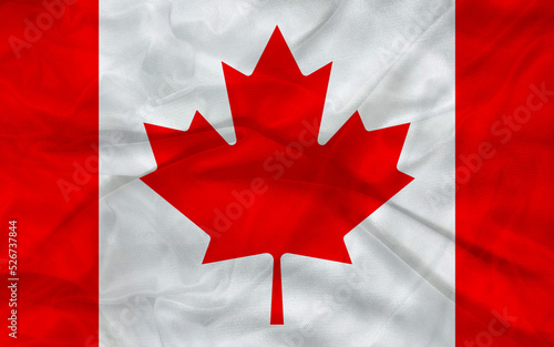 Canada flag is waving. Glossy Canadian flag, white and red.