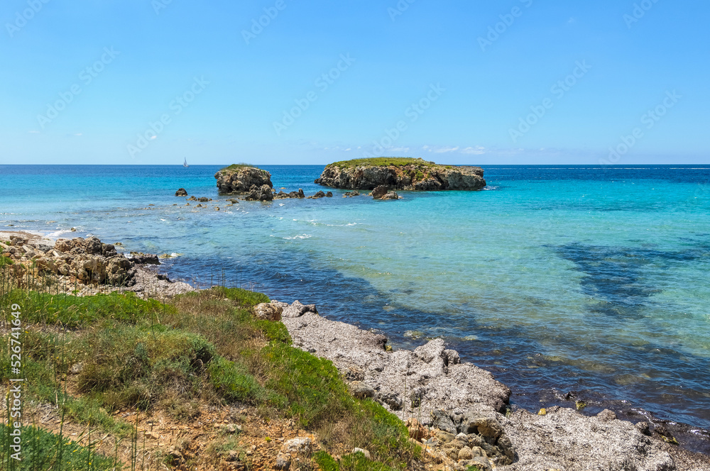 BinIcodrell Beach in Menorca, Spain. BinIcodrell Beach in Menorca, Spain.