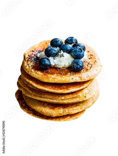 Pile of Oat Pancakes with Coconut cream ,Chia and Blueberries