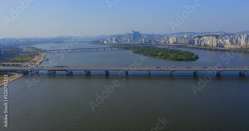 Wallpaper Mural Drone shot traveling forward above the Han river toward the Mapo bridge in Seoul city during the day.  The Bamseom island is visible. Torontodigital.ca