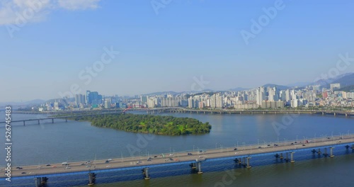Wallpaper Mural Drone shot traveling forward above the Han river toward the Mapo bridge in Seoul city during the day.  The Bamseom island is visible. Torontodigital.ca