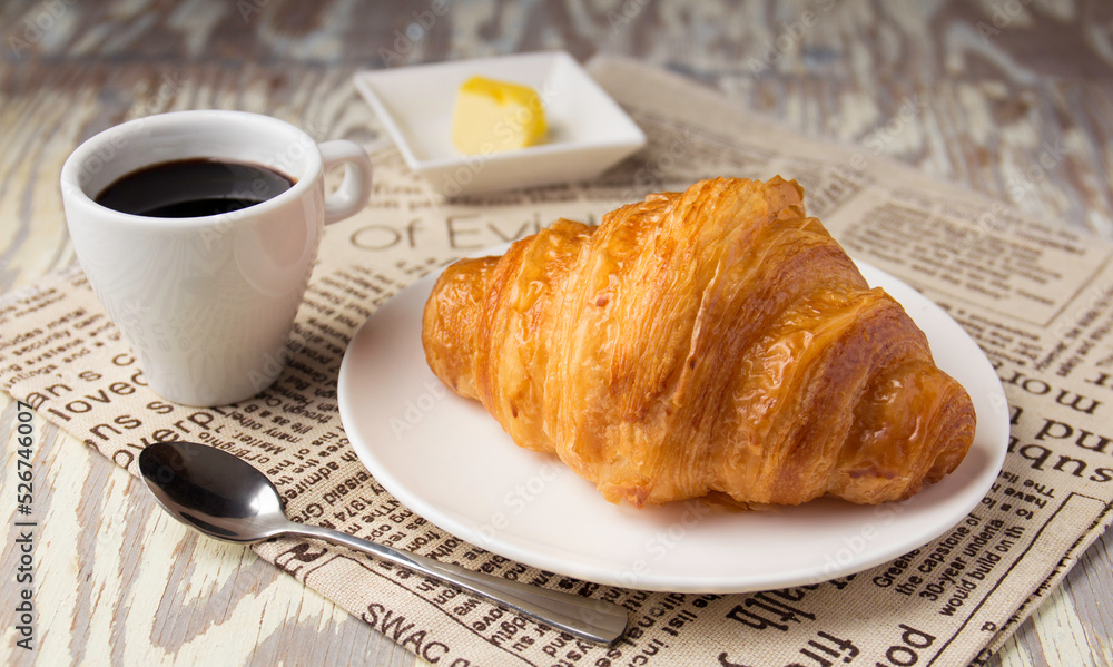 Freshly baked croissants , served with coffee for breakfast Freshly baked croissants , served with coffee for breakfast