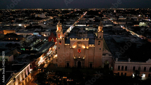 Aerial camera at night showing the front of the Cathedral of Merida, Yucatan, Mexico. photo