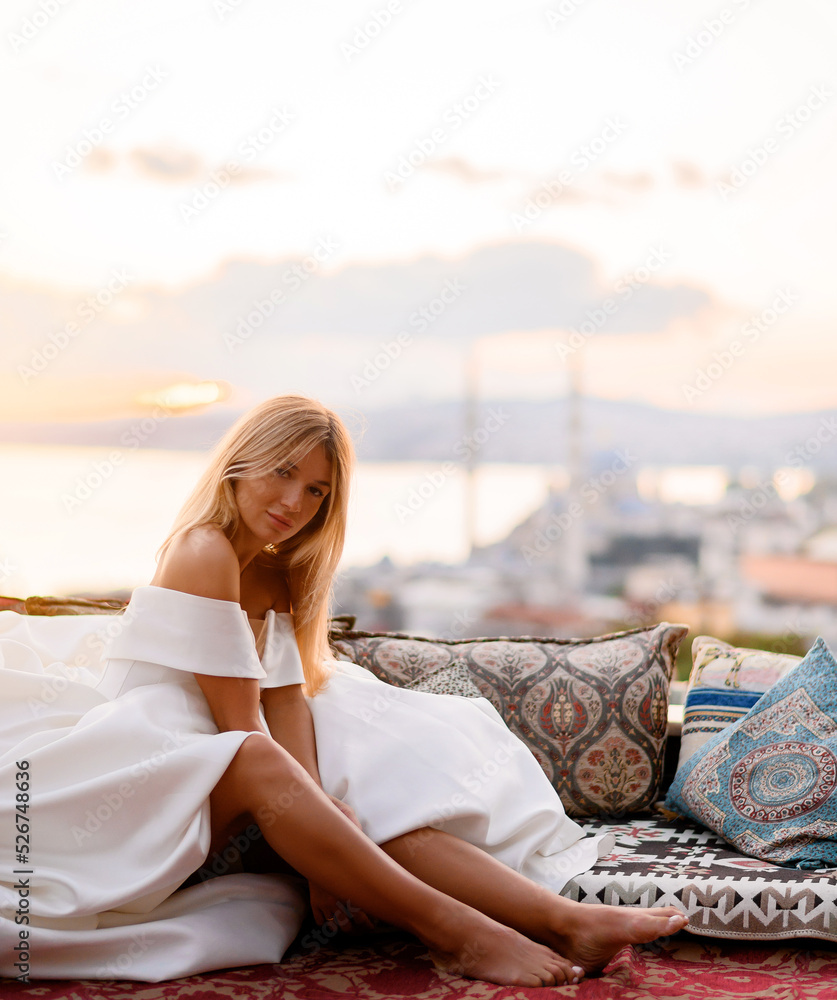 Pretty Female Model Posing On Sea And City Background