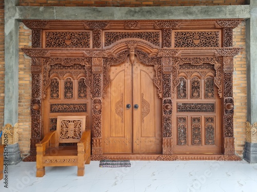 Javanese teak carved door.  In Java it is known as the gebyok door.  traditional wooden door