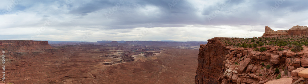 Scenic Panoramic View of American Landscape and Red Rock Mountains in Desert Canyon. Colorful Sky. Canyonlands National Park. Utah, United States. Nature Background Panorama