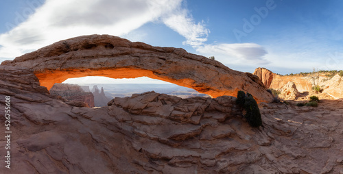 Scenic American Landscape and Red Rock Mountains in Desert Canyon. Spring Season. Sunset Sky. Mesa Arch in Canyonlands National Park. Utah, United States. Nature Background Panorama © edb3_16