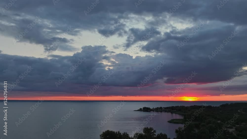 Beautiful timelapse landscape with a sunset over the sea, with lush clouds 4k Beautiful timelapse landscape with a sunset over the sea, with lush clouds 4k