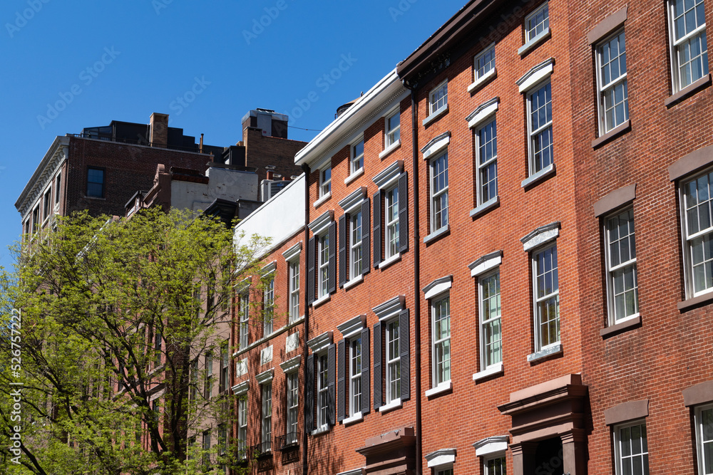 Row of Old Colorful Brick Residential Buildings along a Street in Greenwich Village of New York City