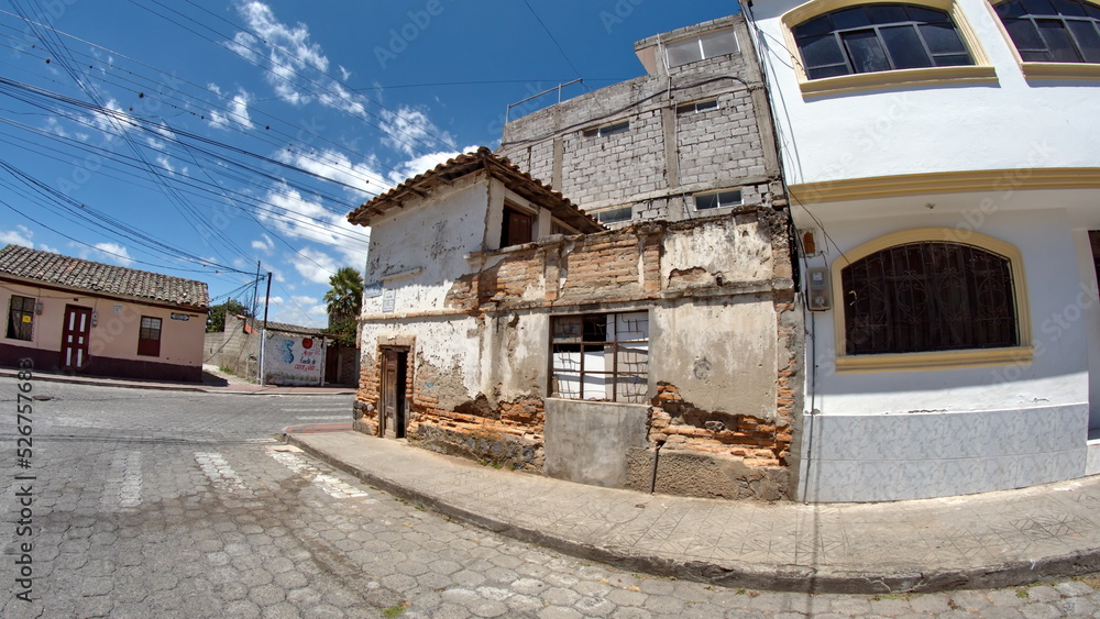 Derelict building on a corner in Cotacachi, Ecuador, taken with a fisheye lens Derelict building on a corner in Cotacachi, Ecuador, taken with a fisheye lens