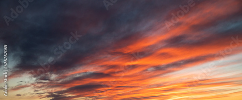 sunset sky with gentle colorful clouds photo