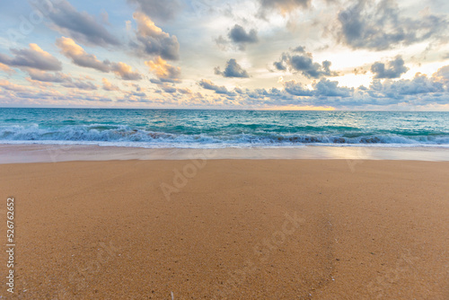Idyllic sunset sky with cloud on sea beach sand wave