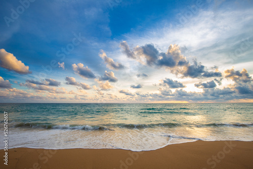 Idyllic sunset sky with cloud on sea beach sand wave © themorningglory