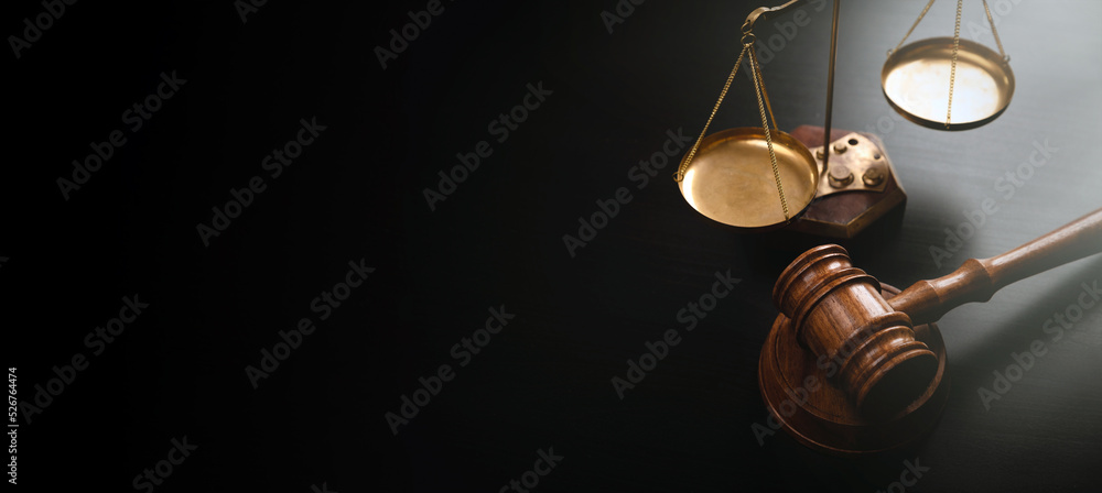 Judge gavel on a wooden desk