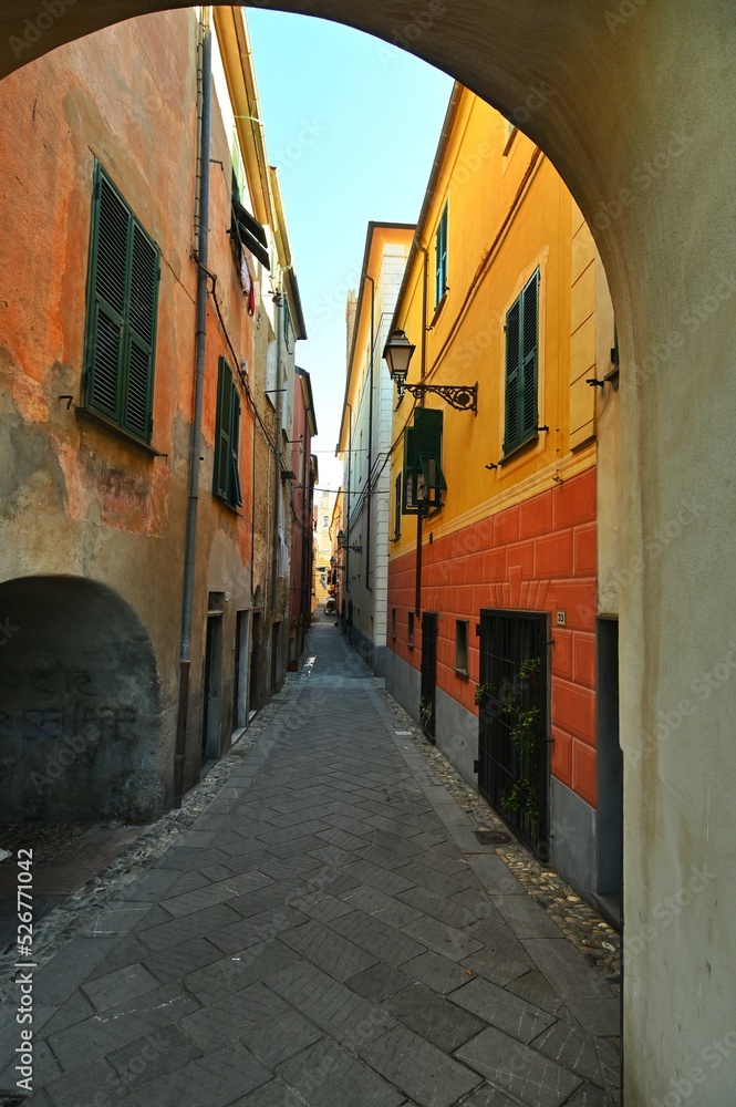 Colorful glimpse of ancient narrow streets Carrugi typical of Ligurian Riviera towns