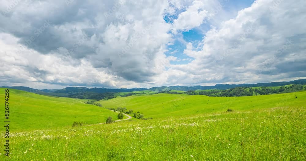 Mountain meadow time-lapse at the summer or autumn time. Wild nature and rural field. Fast clouds movement, green grass and sun rays. Motorised panorama Mountain meadow time-lapse at the summer or autumn time. Wild nature and rural field. Fast clouds movement, green grass and sun rays. Motorised panorama