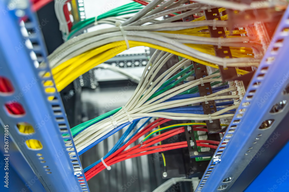 Fototapeta premium Information Technology Computer Network, Telecommunication Ethernet Cables Connected to Internet Switch.