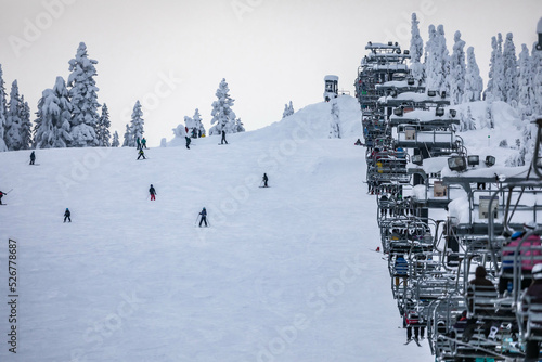 Chairlifts in the snow for the ski season in USA. photo