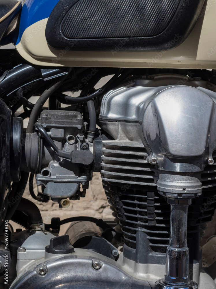 motorcycle engine close up with damage and dust