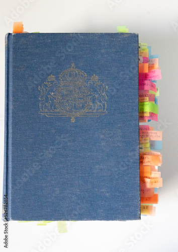 Swedish law book with lots of bookmarks