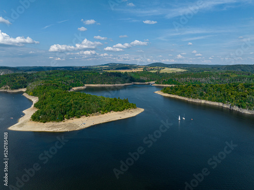 Czechia, Orlik Castle and Vltava River Aerial View. Czech Republic. Beautiful Summer Green Landscape with Orlík Water Reservoir and Boats. View from Above.  photo