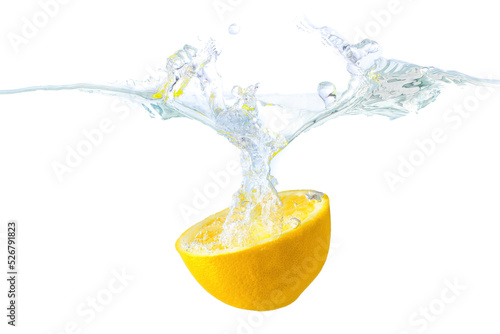 Orange half dropped in water with splashes