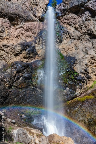 Scenic view of Treasure Falls in bright sunlight in Pagosa Springs, Colorado, Vertical shot photo