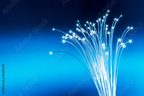 Fotografia, Obraz Bundle of optical fibers with lights in the ends
