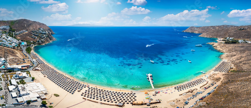 Panoramic aerial view of the popular Elia beach at the island of Mykonos, Cyclades, Greece, during summer time photo