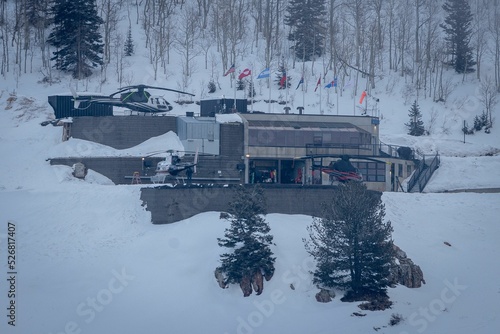 Helicopter base in the snowy mountains of Utah for heli-skiing, USA photo