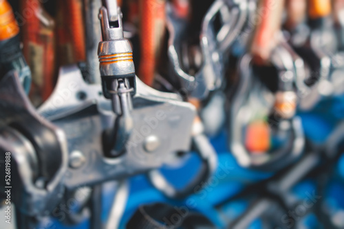 Equipment for climbing sport outdoor, rock climbing alpinism mountaineering gear with helmet, belt, carabiner, rope, harness with belay and protection