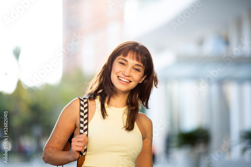 Good looking young woman standing in the city