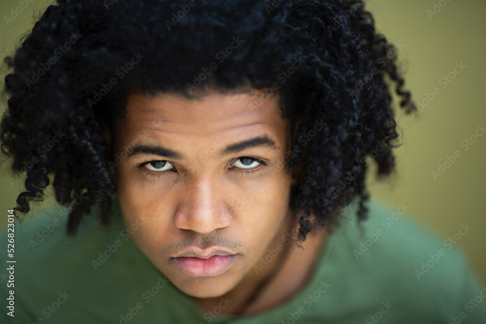 Face of black man with curly hair Face of black man with curly hair