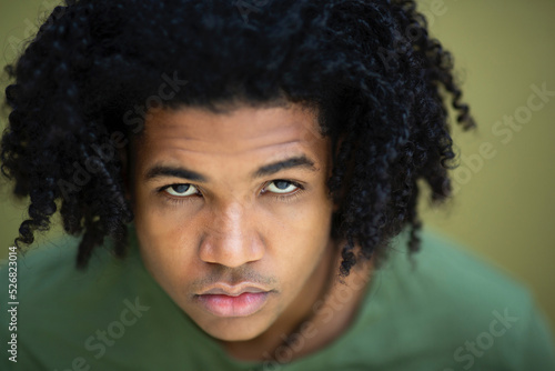 Face of black man with curly hair
