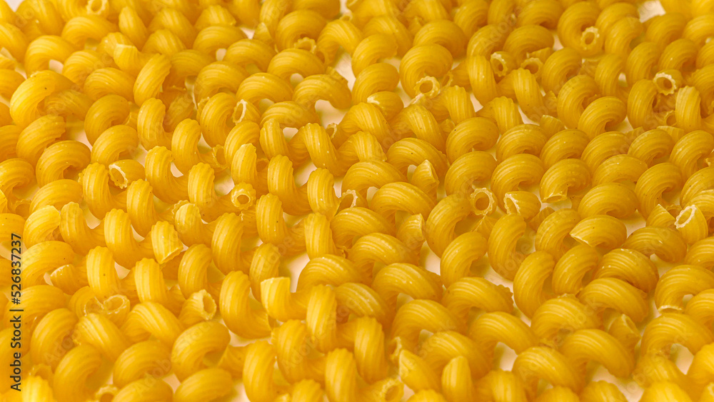 Dry Italian pasta background healthy food photo Dry Italian pasta background healthy food photo
